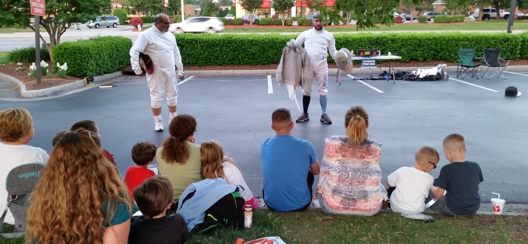 A fencing demonstration as part of Chik-Fil-A's knight-themed family night.